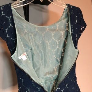 Capped sleeves peplum top with mint green lining